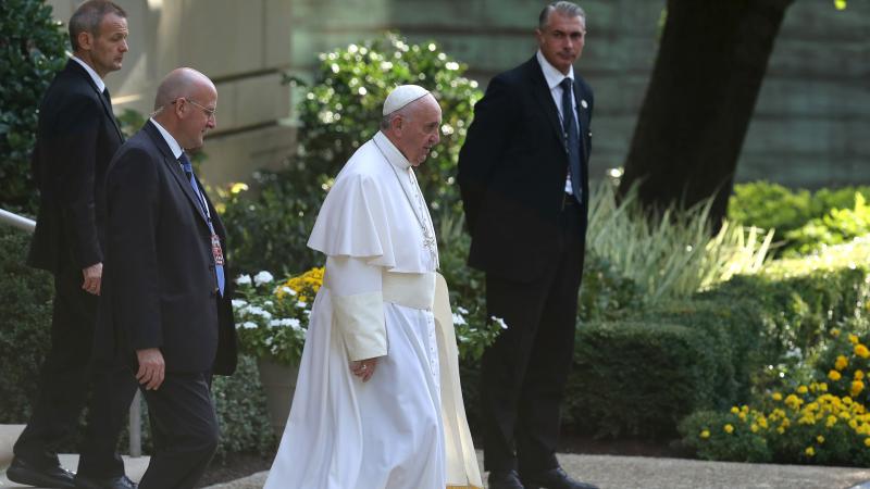 Pope Francis met with Rowan County, Ky., clerk Kim Davis at the Vatican Embassy in Washington last week. He's seen here leaving the embassy building on Thursday. Pope Francis met with Rowan County, Ky., clerk Kim Davis at the Vatican Embassy in Washington last week. He's seen here leaving the embassy building on Thursday.