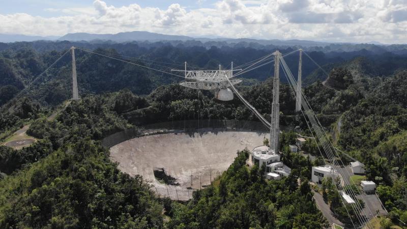 The Arecibo Observatory's mammoth telescope collapsed overnight. It's seen here in November, after a cable damaged its dish. The Arecibo Observatory's mammoth telescope collapsed overnight. It's seen here in November, after a cable damaged its dish.