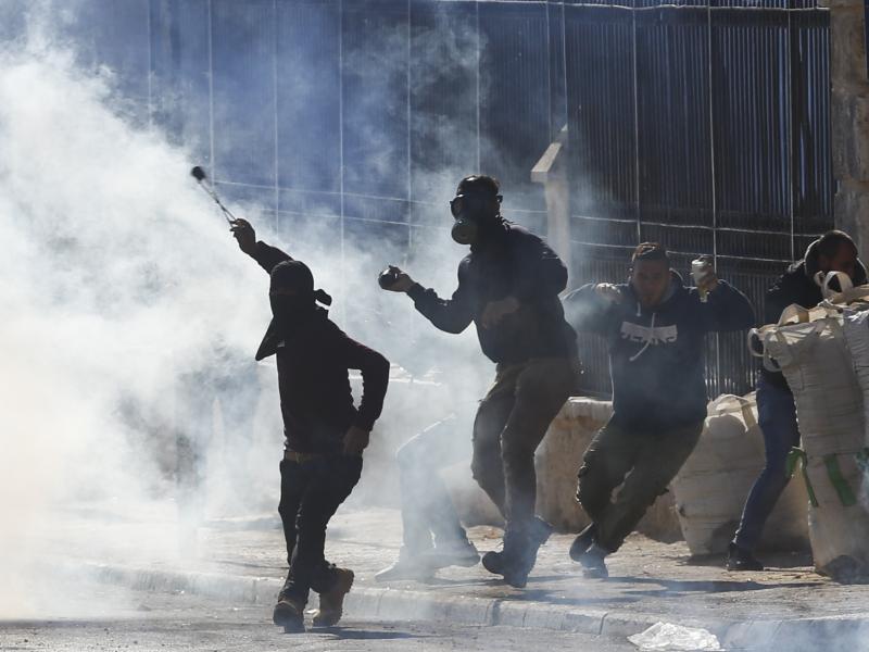 Palestinians in the West Bank clash with Israeli troops during a protest against President Trump's recognition of Jerusalem as Israel's capital. Palestinians in the West Bank clash with Israeli troops during a protest against President Trump's recognition of Jerusalem as Israel's capital.