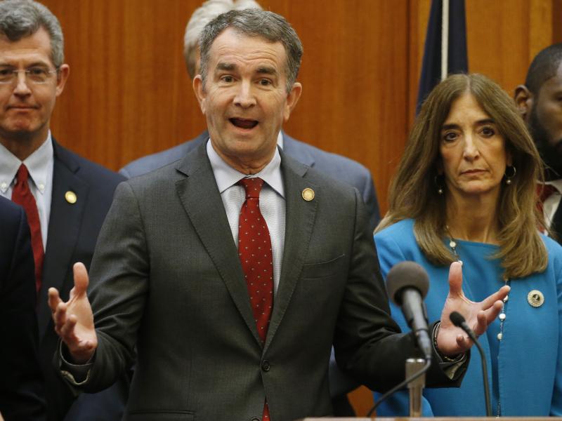 Virginia Gov. Ralph Northam, (front) announced schools in the state will remained closed for at least the rest of the academic school year. Virginia Gov. Ralph Northam, (front) announced schools in the state will remained closed for at least the rest of the academic school year.