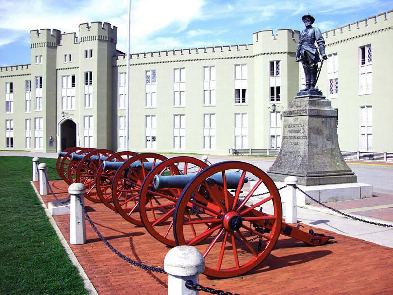 The statue of Confederate Gen. Thomas "Stonewall" Jackson in front of the barracks at Virginia Military Institute in an archival photo. VMI began removing the statue Monday. The statue of Confederate Gen. Thomas "Stonewall" Jackson in front of the barracks at Virginia Military Institute in an archival photo. VMI began removing the statue Monday.