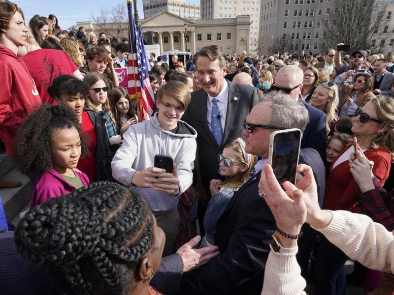 Last month, Virginia Gov. Glenn Youngkin posed with school children and parents after signing a bill that bans mask mandates in public schools in Virginia. Last month, Virginia Gov. Glenn Youngkin posed with school children and parents after signing a bill that bans mask mandates in public schools in Virginia.