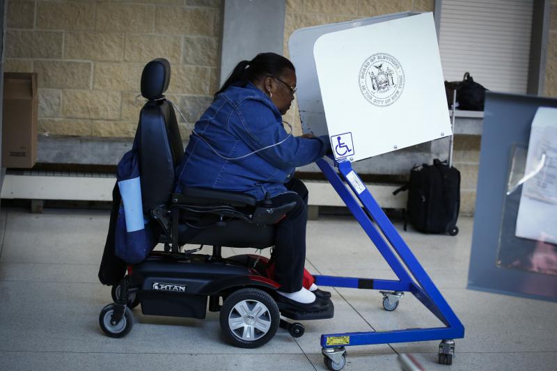 A woman casts her vote at a polling station in Brooklyn in the New York state presidential primary on April 19. A woman casts her vote at a polling station in Brooklyn in the New York state presidential primary on April 19.