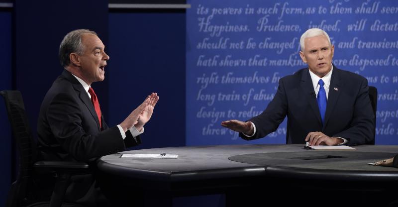 Sen. Tim Kaine, D-Va., left, and Gov. Mike Pence, R-Ind., speak during the vice presidential debate at Longwood University in Farmville, Va. Sen. Tim Kaine, D-Va., left, and Gov. Mike Pence, R-Ind., speak during the vice presidential debate at Longwood University in Farmville, Va.