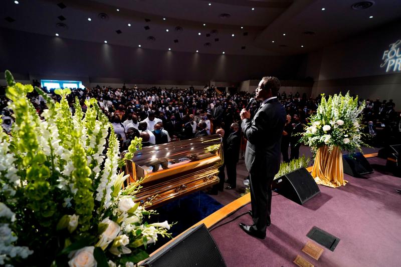 The Rev. Remus Wright speaks during Tuesday's funeral service for George Floyd at The Fountain of Praise church in Houston. The Rev. Remus Wright speaks during Tuesday's funeral service for George Floyd at The Fountain of Praise church in Houston.