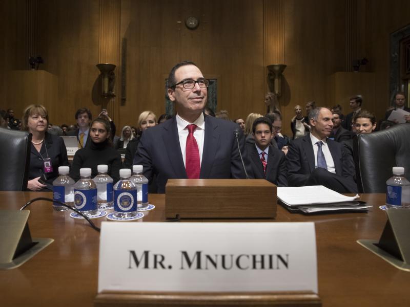 Treasury Secretary nominee Steven Mnuchin testifies at a confirmation on Capitol Hill. He faced tough questioning from Democrats over his running of a bank that profited from the housing crisis. Treasury Secretary nominee Steven Mnuchin testifies at a confirmation on Capitol Hill. He faced tough questioning from Democrats over his running of a bank that profited from the housing crisis.