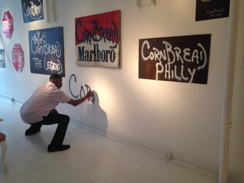 Darryl "Cornbread" McCray tags the wall at Paradigm Gallery in Philadelphia. Darryl "Cornbread" McCray tags the wall at Paradigm Gallery in Philadelphia.