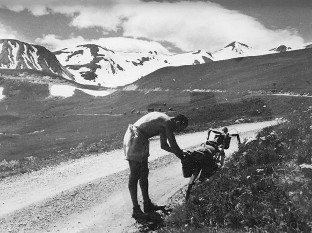 Jacques Enoch with his bike in the Alps in 1941. Danièle Enoch-Maillard's father, who was Jewish, survived World War II in an Alpine village with the help of a deputy mayor and a postal worker who sent smoke signals every time the Nazis headed up the mou Jacques Enoch with his bike in the Alps in 1941. Danièle Enoch-Maillard's father, who was Jewish, survived World War II in an Alpine village with the help of a deputy mayor and a postal worker who sent smoke signals every time the Nazis headed up the mou