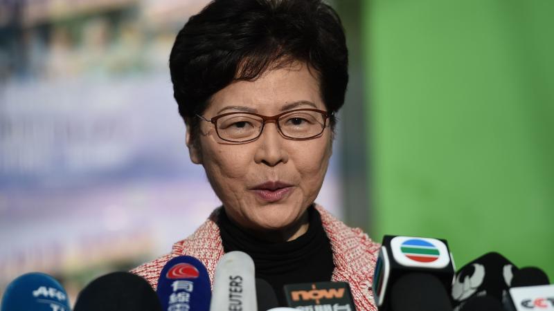 Hong Kong Chief Executive Carrie Lam addresses the media after casting her vote during Sunday's district council elections. After results showed a landslide victory for pro-democracy candidates, Lam said she would listen "humbly" to the will of the voters Hong Kong Chief Executive Carrie Lam addresses the media after casting her vote during Sunday's district council elections. After results showed a landslide victory for pro-democracy candidates, Lam said she would listen "humbly" to the will of the voters