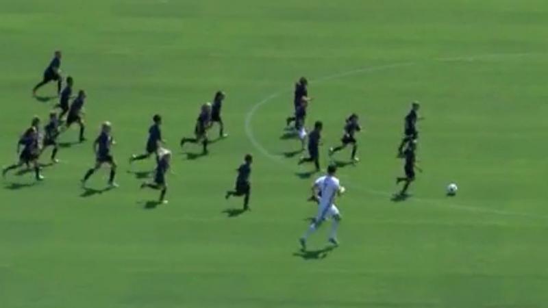 Two members of the LA Galaxy took on a team of 30 8-year-olds, in a matchup of (young) age and (soccer) beauty. Two members of the LA Galaxy took on a team of 30 8-year-olds, in a matchup of (young) age and (soccer) beauty.