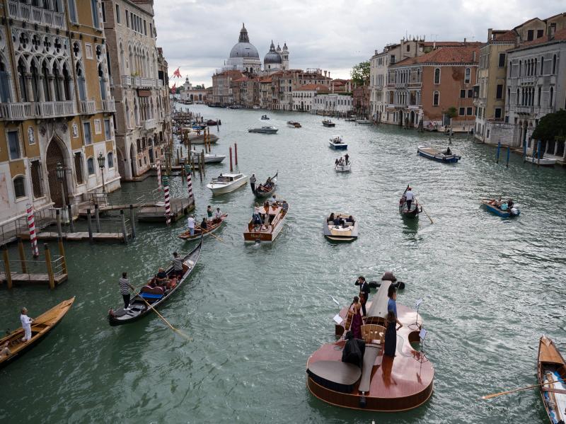 "Noah's Violin", a giant floating violin by Venetian sculptor Livio De Marchi, journeyed through Venice's Grand Canal on Saturday. De Marchi, who has sent many wooden works into the water, came up with the idea during last year's pandemic lockdown. "Noah's Violin", a giant floating violin by Venetian sculptor Livio De Marchi, journeyed through Venice's Grand Canal on Saturday. De Marchi, who has sent many wooden works into the water, came up with the idea during last year's pandemic lockdown.