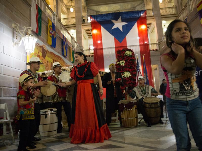 A musical group playing traditional Puerto Rican bomba music performs at a parranda in Hartford, Conn. A musical group playing traditional Puerto Rican bomba music performs at a parranda in Hartford, Conn.