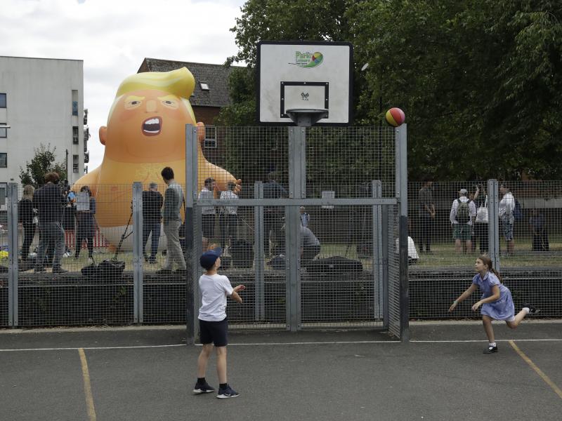 A 20-foot-tall blimp depicting President Trump as a cartoon baby stands inflated in London's Bingfield Park. It will hover above Parliament Square later this week during the president's visit. A 20-foot-tall blimp depicting President Trump as a cartoon baby stands inflated in London's Bingfield Park. It will hover above Parliament Square later this week during the president's visit.