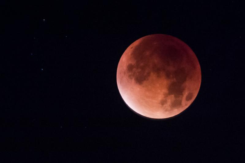 Earth's shadow obscures the view of a so-called supermoon during another total lunar eclipse — this one in Brussels in 2015. Earth's shadow obscures the view of a so-called supermoon during another total lunar eclipse — this one in Brussels in 2015.