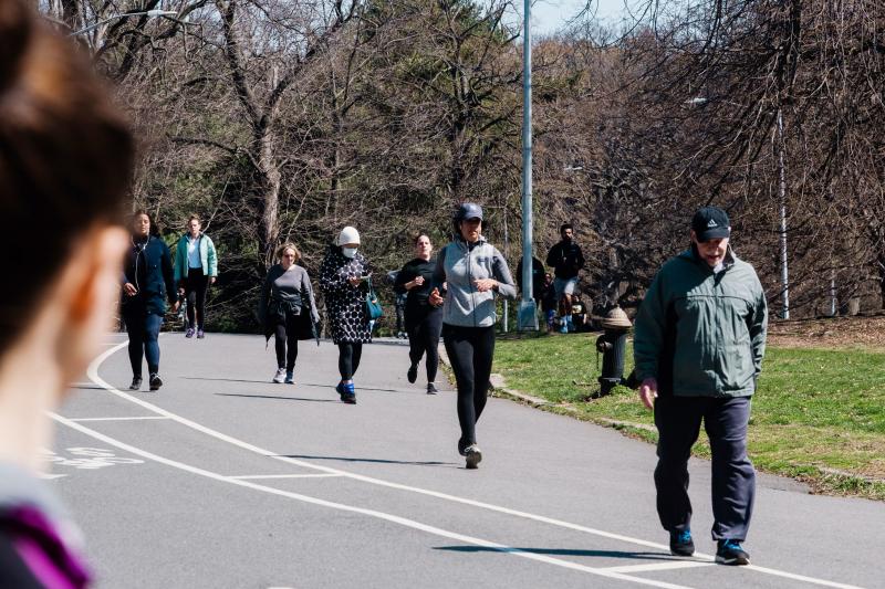 People walk and jog through Prospect Park in Brooklyn last week. New York Gov. Andrew Cuomo said that the restrictions on daily life in New York have slowed the increase in hospitalizations. People walk and jog through Prospect Park in Brooklyn last week. New York Gov. Andrew Cuomo said that the restrictions on daily life in New York have slowed the increase in hospitalizations.