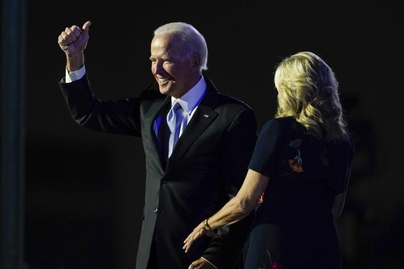 President-elect Joe Biden stands on stage with his wife, Jill Biden, on Saturday in Wilmington, Del. The incoming first lady is an English professor at Northern Virginia Community College. President-elect Joe Biden stands on stage with his wife, Jill Biden, on Saturday in Wilmington, Del. The incoming first lady is an English professor at Northern Virginia Community College.