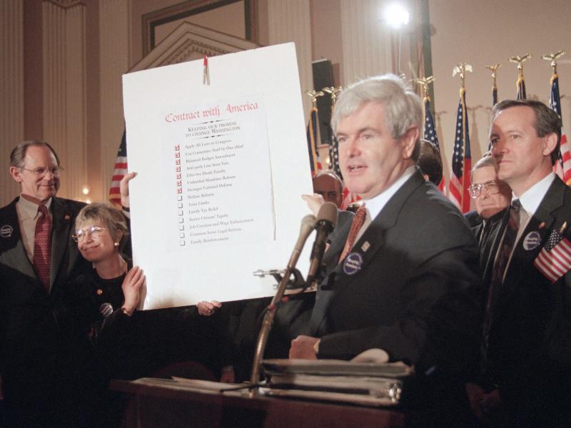 Then-House Speaker Newt Gingrich holds up a score card during a Republican rally at Capitol Hill in February of 1995. The rally was to mark progress the GOP made on their "Contract with America" in the early days of the "Republican Revolution." Then-House Speaker Newt Gingrich holds up a score card during a Republican rally at Capitol Hill in February of 1995. The rally was to mark progress the GOP made on their "Contract with America" in the early days of the "Republican Revolution."