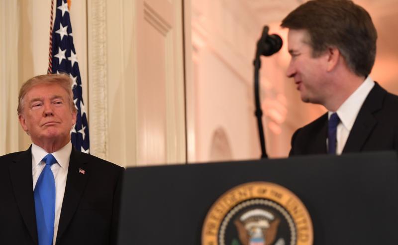 President Trump looks on as Judge Brett Kavanaugh speaks after being nominated to the Supreme Court last month. President Trump looks on as Judge Brett Kavanaugh speaks after being nominated to the Supreme Court last month.