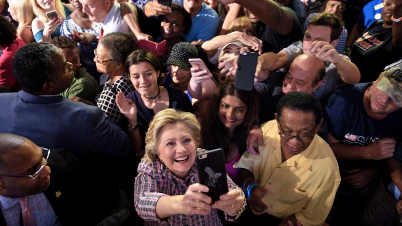 Democratic presidential nominee Hillary Clinton takes a selfie with supporters after speaking at a rally about national service Sept. 30 in Fort Pierce, Fla. Democratic presidential nominee Hillary Clinton takes a selfie with supporters after speaking at a rally about national service Sept. 30 in Fort Pierce, Fla.