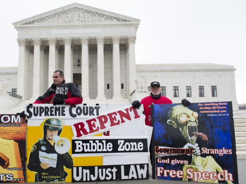 Anti-abortion-rights demonstrators stand outside the U.S. Supreme Court in 2014 after oral arguments over buffer zones around abortion clinics. Anti-abortion-rights demonstrators stand outside the U.S. Supreme Court in 2014 after oral arguments over buffer zones around abortion clinics.
