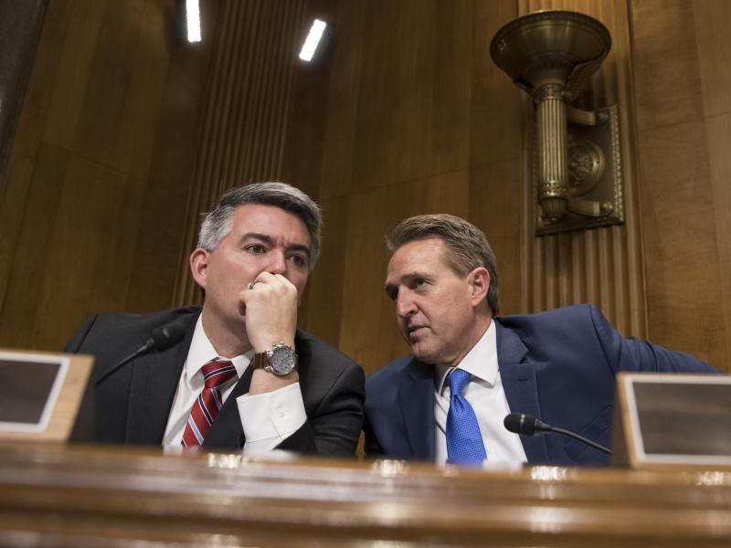 Colorado Republican Sen. Cory Gardner, left, and Arizona Republican Sen. Jeff Flake confer as the Senate Foreign Relations Subcommittee on the Western Hemisphere examines attacks on American diplomats in Havana, on Capitol Hill in Washington, Tuesday. Colorado Republican Sen. Cory Gardner, left, and Arizona Republican Sen. Jeff Flake confer as the Senate Foreign Relations Subcommittee on the Western Hemisphere examines attacks on American diplomats in Havana, on Capitol Hill in Washington, Tuesday.