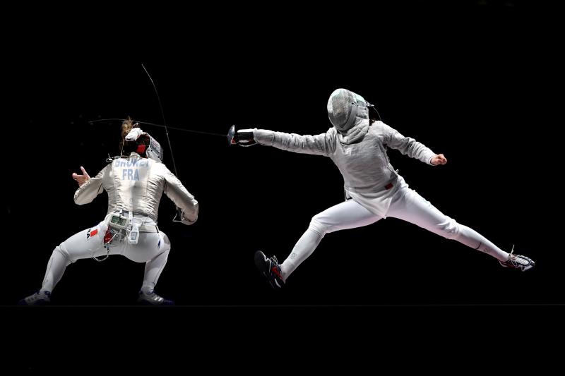 Over two weeks, critic Linda Holmes watched every Olympic discipline, from archery to wrestling. Above, Manon Brunet of Team France, left, competes against Olga Nikitina of Team ROC during the Women's Sabre Team Fencing Gold Medal Match on day eight of th Over two weeks, critic Linda Holmes watched every Olympic discipline, from archery to wrestling. Above, Manon Brunet of Team France, left, competes against Olga Nikitina of Team ROC during the Women's Sabre Team Fencing Gold Medal Match on day eight of th