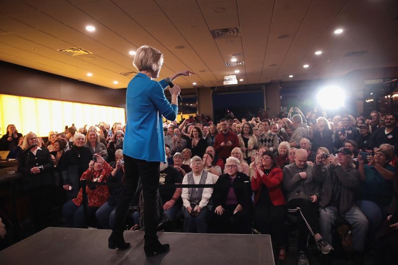 Sen. Elizabeth Warren, D-Mass., speaks to potential voters during a campaign stop on Friday in Council Bluffs, Iowa. Sen. Elizabeth Warren, D-Mass., speaks to potential voters during a campaign stop on Friday in Council Bluffs, Iowa.