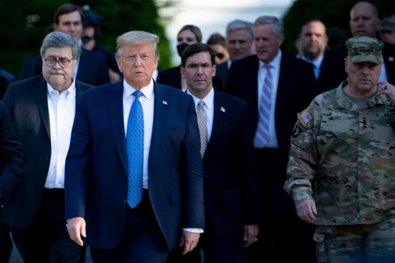 President Trump walks from the White House to visit St. John's Church after the area was cleared of people protesting the death of George Floyd. President Trump walks from the White House to visit St. John's Church after the area was cleared of people protesting the death of George Floyd.