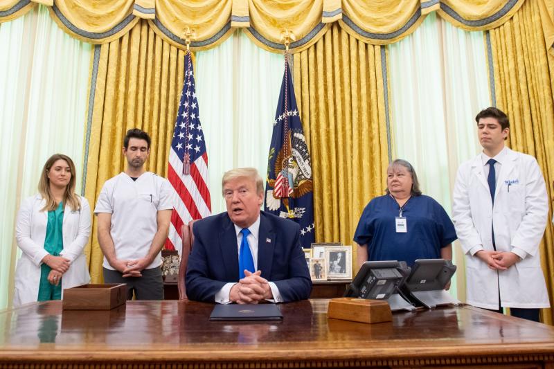 President Trump speaks about COVID-19 alongside nurses after signing a proclamation in honor of National Nurses Day in the Oval Office of the White House on Wednesday. Trump and Vice President Pence have not worn face masks during public events, which goe President Trump speaks about COVID-19 alongside nurses after signing a proclamation in honor of National Nurses Day in the Oval Office of the White House on Wednesday. Trump and Vice President Pence have not worn face masks during public events, which goe