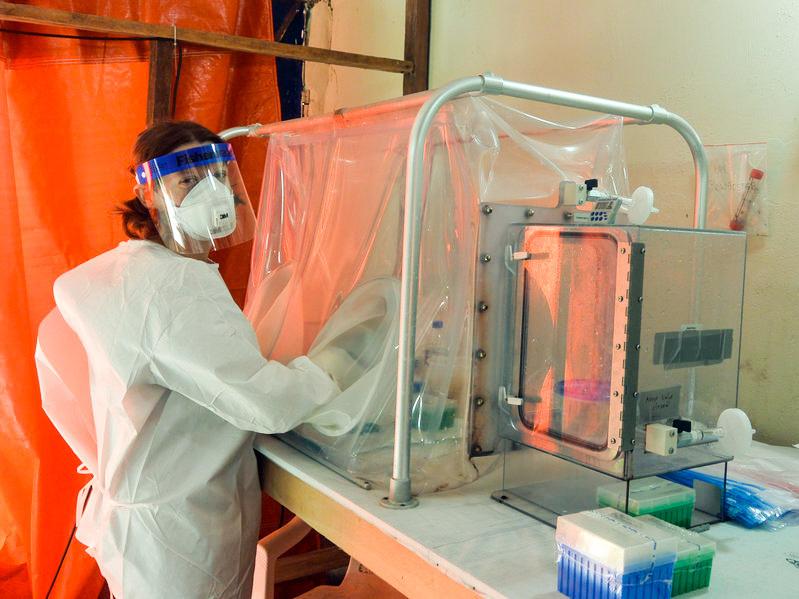 Emmie de Wit, who usually works in a Biosafety Level 4 Lab, spent time in less secure labs in Liberia during the Ebola outbreak in West Africa. Above, she prepares to test Ebola patient blood samples. Emmie de Wit, who usually works in a Biosafety Level 4 Lab, spent time in less secure labs in Liberia during the Ebola outbreak in West Africa. Above, she prepares to test Ebola patient blood samples.