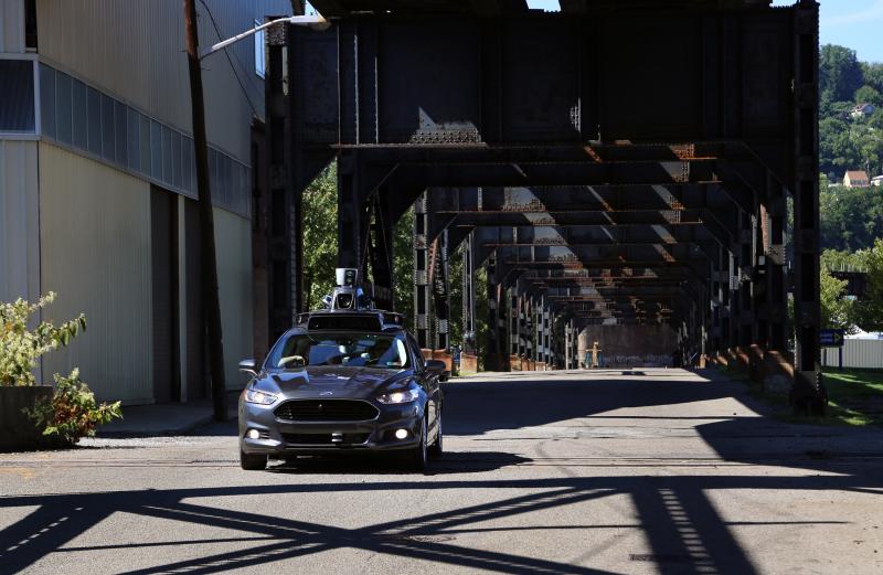 A self-driving car leaves Uber's newest riverside hub in Pittsburgh. Company officials say the Rust Belt city is perfect for beta testing, citing diverse topography, frequent weather maladies, near-constant construction and hundreds of bridges and tunnels A self-driving car leaves Uber's newest riverside hub in Pittsburgh. Company officials say the Rust Belt city is perfect for beta testing, citing diverse topography, frequent weather maladies, near-constant construction and hundreds of bridges and tunnels