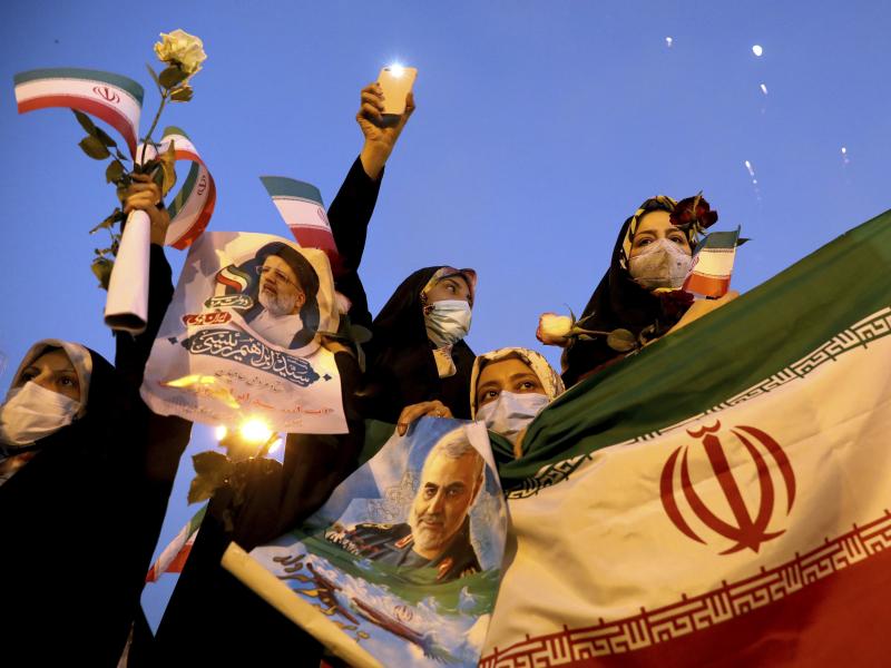 Supporters of Iranian President-elect Ebrahim Raisi celebrate in Tehran on Saturday after he won the presidential election. Supporters of Iranian President-elect Ebrahim Raisi celebrate in Tehran on Saturday after he won the presidential election.