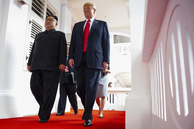 North Korea's leader Kim Jong Un and President Trump walk together at a resort on Sentosa Island in Singapore on June 12, 2018. North Korea's leader Kim Jong Un and President Trump walk together at a resort on Sentosa Island in Singapore on June 12, 2018.