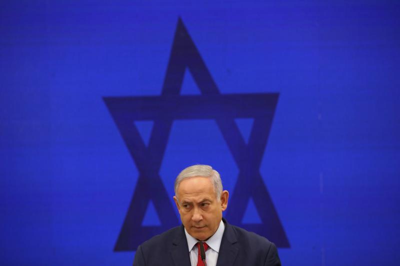 Israeli Prime Minister Benjamin Netanyahu speaks during a news conference in Tel Aviv last September. Netanyahu, the country's longest-serving prime minister, will go to court on Sunday charged with bribery, fraud and breach of trust. Israeli Prime Minister Benjamin Netanyahu speaks during a news conference in Tel Aviv last September. Netanyahu, the country's longest-serving prime minister, will go to court on Sunday charged with bribery, fraud and breach of trust.