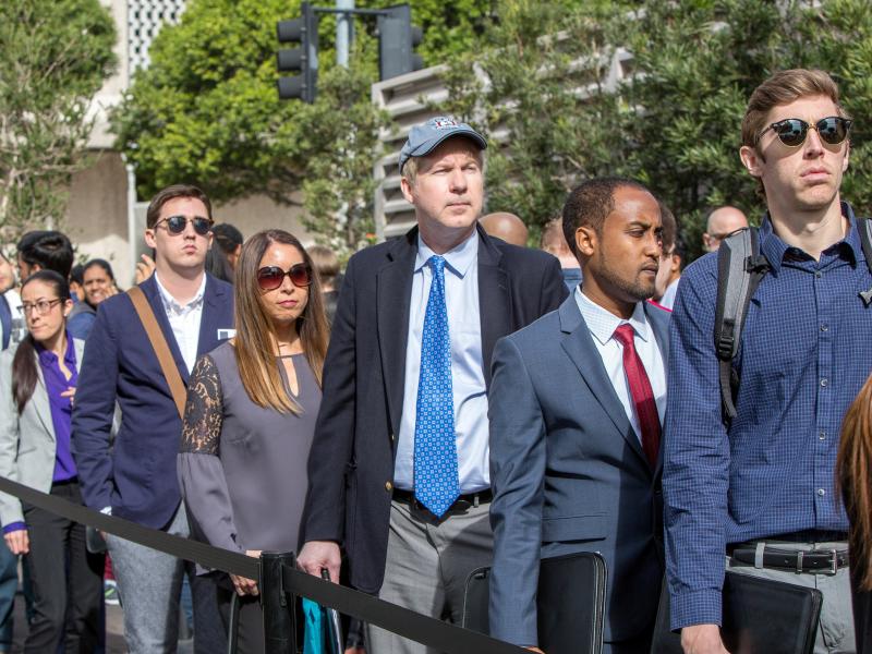 Job seekers line up at a technology fair in Los Angeles in March. Analysts projected the unemployment rate stayed at a nearly 50-year low of 3.7 percent in October. Job seekers line up at a technology fair in Los Angeles in March. Analysts projected the unemployment rate stayed at a nearly 50-year low of 3.7 percent in October.