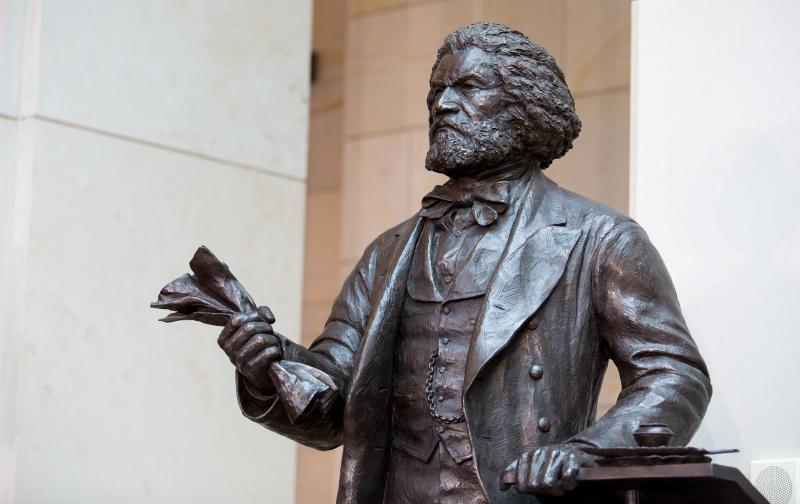The Frederick Douglass Statue in Emancipation Hall at the U.S. Capitol in 2013. On July 3, the National Archives hosted a reading of Douglass' essay about the Fourth of July. The Frederick Douglass Statue in Emancipation Hall at the U.S. Capitol in 2013. On July 3, the National Archives hosted a reading of Douglass' essay about the Fourth of July.