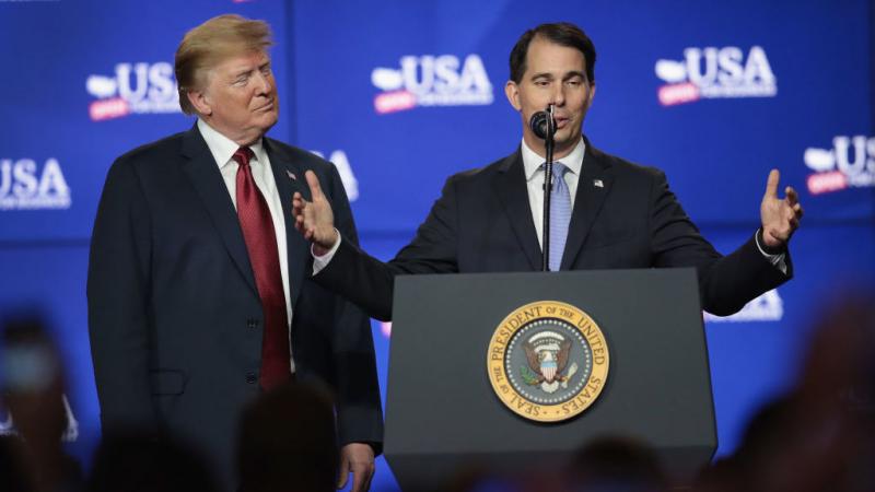 President Trump and Wisconsin Gov. Scott Walker participate in a groundbreaking ceremony for the $10 billion Foxconn factory complex in June. President Trump and Wisconsin Gov. Scott Walker participate in a groundbreaking ceremony for the $10 billion Foxconn factory complex in June.