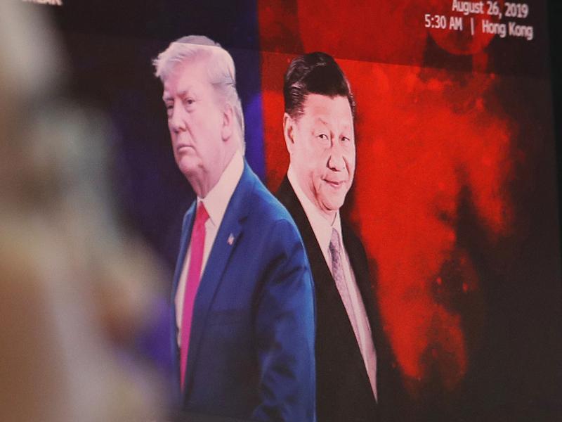 A computer screen in Seoul shows images of Chinese President Xi Jinping and President Donald Trump in 2019. A computer screen in Seoul shows images of Chinese President Xi Jinping and President Donald Trump in 2019.