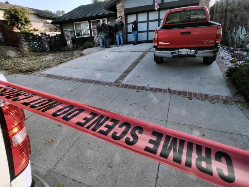 Ventura County sheriff's deputies stand outside the house of shooting suspect Ian David Long on Thursday in Newbury Park, Calif. Authorities said the Marine veteran opened fire at a country music bar in Thousand Oaks on Wednesday night. Ventura County sheriff's deputies stand outside the house of shooting suspect Ian David Long on Thursday in Newbury Park, Calif. Authorities said the Marine veteran opened fire at a country music bar in Thousand Oaks on Wednesday night.