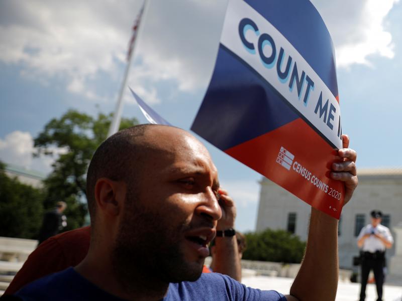 Demonstrators hold signs saying "Count Me In" outside the U.S. Supreme Court in Washington, D.C., in 2019, when the court blocked former President Donald Trump's administration from adding a citizenship question to 2020 census forms. Demonstrators hold signs saying "Count Me In" outside the U.S. Supreme Court in Washington, D.C., in 2019, when the court blocked former President Donald Trump's administration from adding a citizenship question to 2020 census forms.