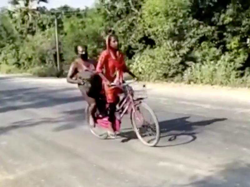 In this screen grab from video posted by BBC News Hindi, Jyoti Kumari, then 15, rides with her father during their 700-mile journey to their family's village of Sirhulli in eastern India. In this screen grab from video posted by BBC News Hindi, Jyoti Kumari, then 15, rides with her father during their 700-mile journey to their family's village of Sirhulli in eastern India.