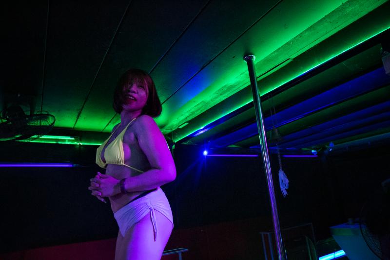 M. dances at a go-go bar. She was working as a topless dancer — and also as a sex worker — in the tourist city of Pattaya, Thailand, until the bar closed down in January. She decided to return to her hometown to look for work in a different sector. M. dances at a go-go bar. She was working as a topless dancer — and also as a sex worker — in the tourist city of Pattaya, Thailand, until the bar closed down in January. She decided to return to her hometown to look for work in a different sector.