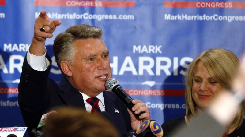 North Carolina 9th district Republican congressional candidate Mark Harris, with his wife Beth, claims victory in his congressional race in Monroe, N.C. The race, however, has yet to be certified as authorities look into fraud claims in the eastern part o North Carolina 9th district Republican congressional candidate Mark Harris, with his wife Beth, claims victory in his congressional race in Monroe, N.C. The race, however, has yet to be certified as authorities look into fraud claims in the eastern part o