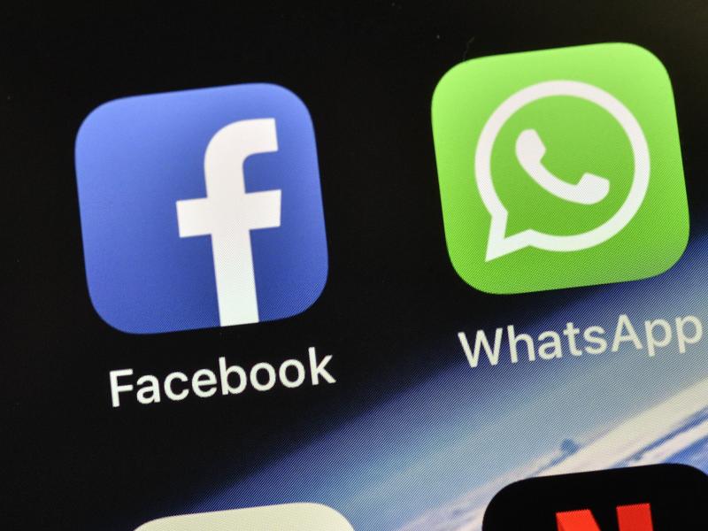 The icons of Facebook and WhatsApp. The icons of Facebook and WhatsApp.