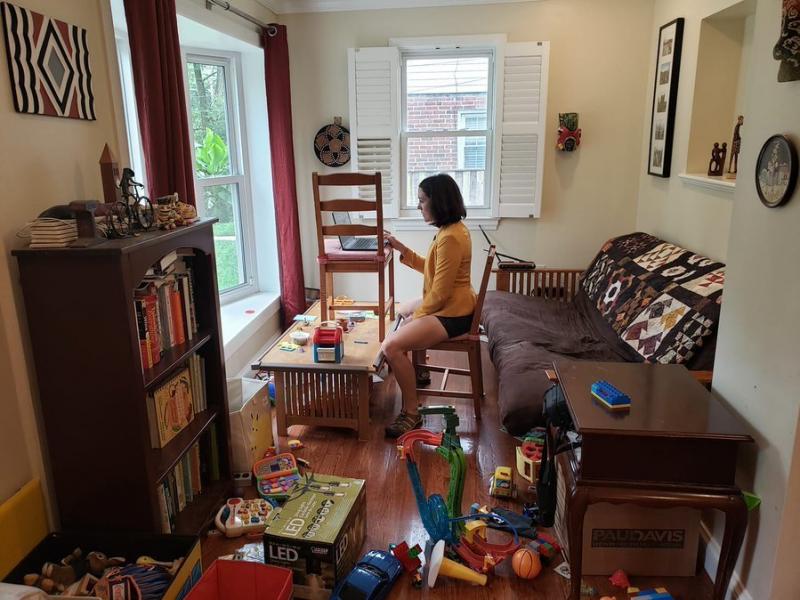 Gretchen Goldman shared this behind-the-scenes photo on Twitter of what it's like to work from home and parent during the pandemic. Gretchen Goldman shared this behind-the-scenes photo on Twitter of what it's like to work from home and parent during the pandemic.