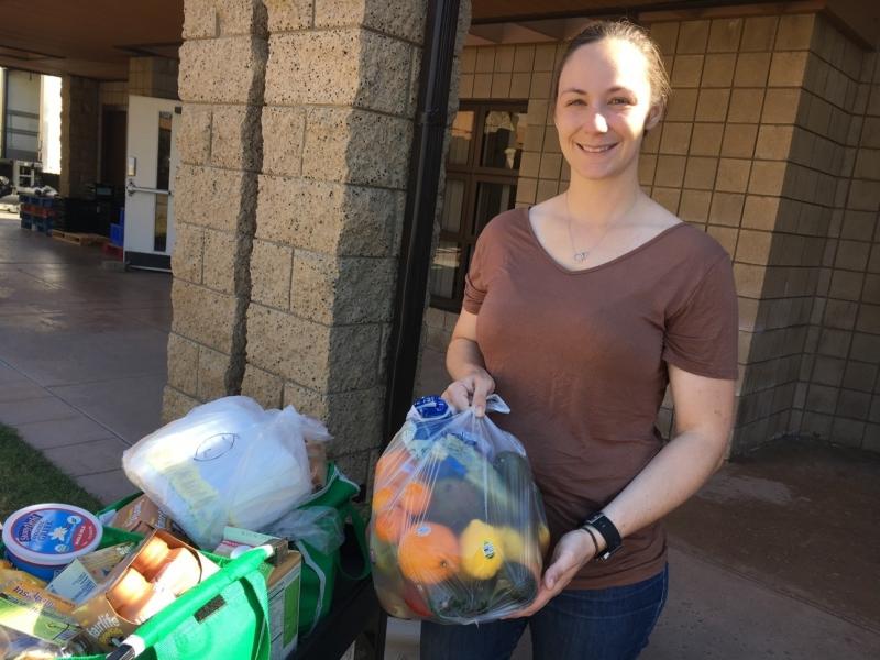 Kara Dethlefsen, an active-duty Marine, attends the monthly food pantry at the Camp Pendleton Marine Corps Base near San Diego. Her husband is also a Marine. She says the food assistance is helping them get ready for his transition back to civilian life. Kara Dethlefsen, an active-duty Marine, attends the monthly food pantry at the Camp Pendleton Marine Corps Base near San Diego. Her husband is also a Marine. She says the food assistance is helping them get ready for his transition back to civilian life.