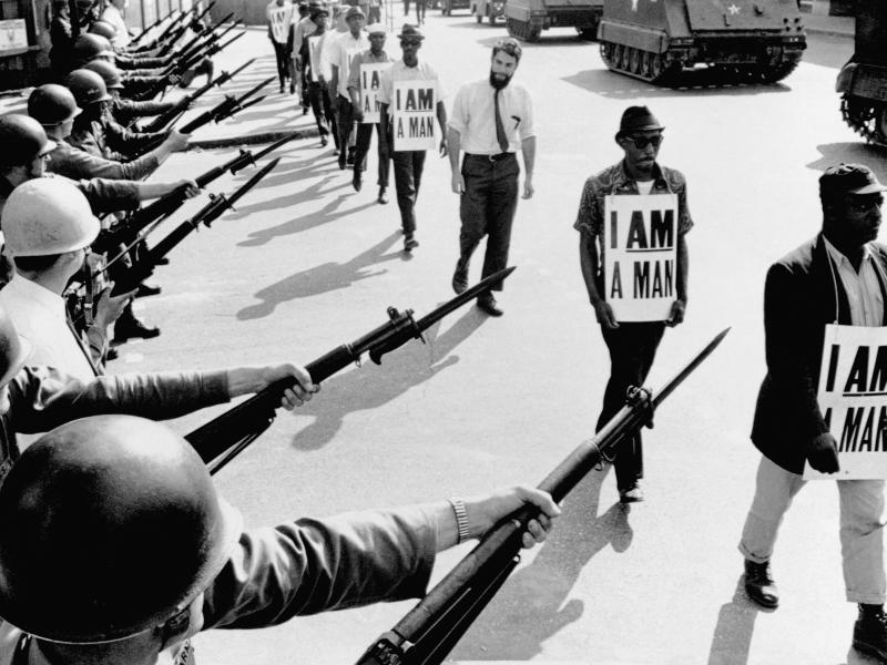 Civil rights activists are blocked by National Guardsmen brandishing bayonets while trying to stage a protest on Beale Street in Memphis, Tenn. Civil rights activists are blocked by National Guardsmen brandishing bayonets while trying to stage a protest on Beale Street in Memphis, Tenn.
