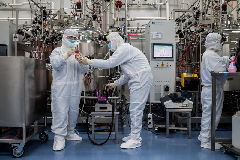 Engineers work on a potential vaccine for the coronavirus at a Beijing lab. Engineers work on a potential vaccine for the coronavirus at a Beijing lab.