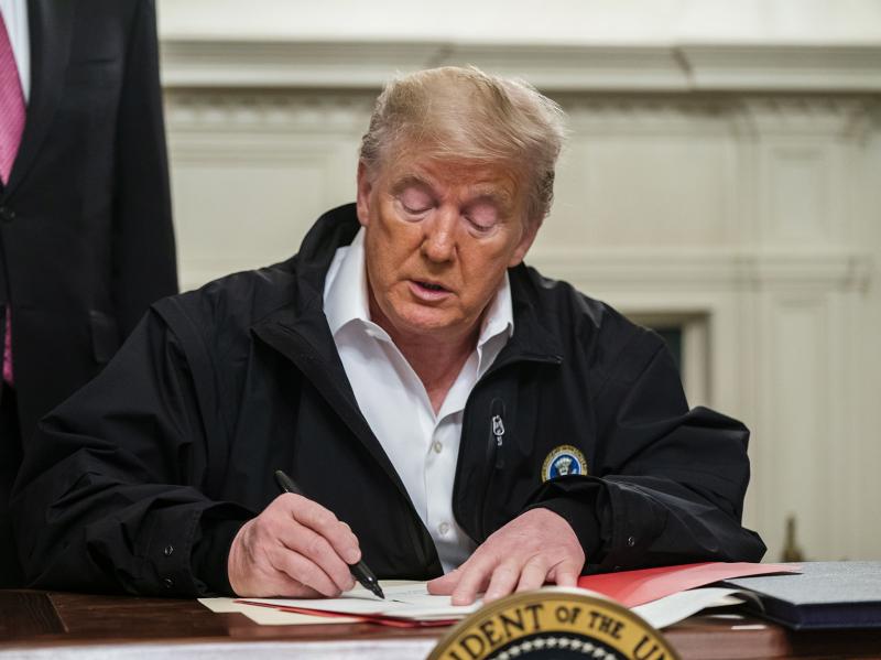 President Trump signs an $8.3 billion emergency spending bill in the White House Friday. That's significantly more than he originally requested from Congress. President Trump signs an $8.3 billion emergency spending bill in the White House Friday. That's significantly more than he originally requested from Congress.