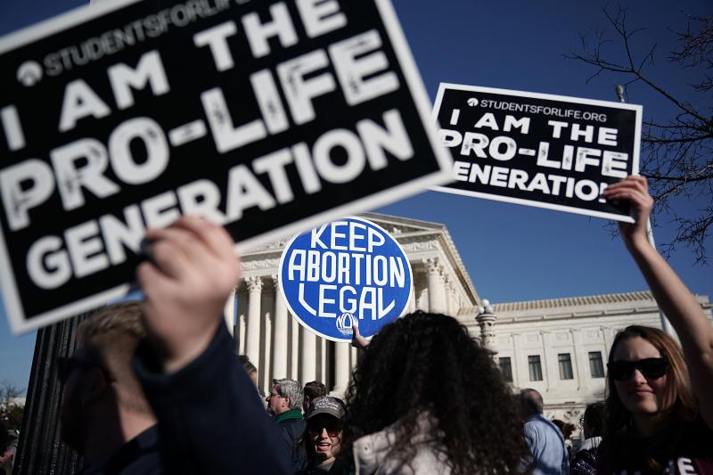 Demonstrators in favor of and against abortion rights made their beliefs known during a January 2018 protest in Washington, D.C. Demonstrators in favor of and against abortion rights made their beliefs known during a January 2018 protest in Washington, D.C.